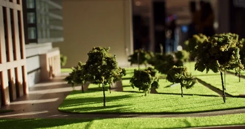 Closeup macro shot of 3d architecture maquette of modern city with green square Video stock 120739537