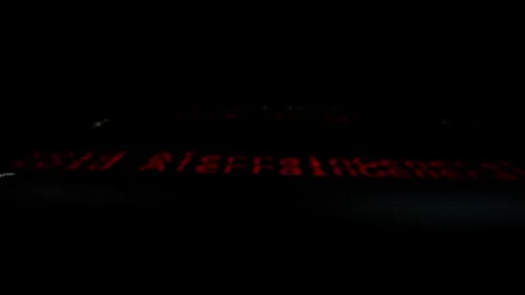 Closeup macro shot movement of coding script moving across LED screen. Stock Footage 241005715