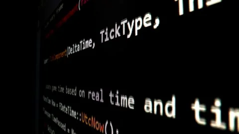 Closeup macro shot movement of coding script moving across LED screen. Stock Footage 246056406
