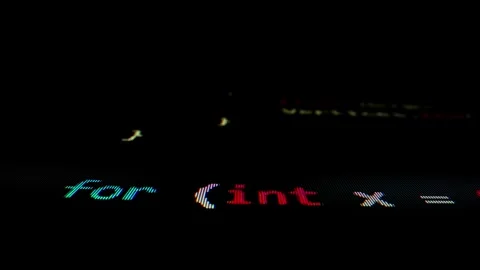 Closeup macro shot movement of coding script moving across LED screen. Stock Footage 246538484
