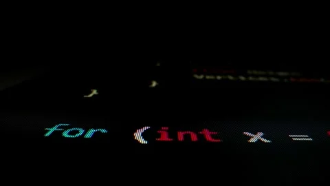 Closeup macro shot movement of coding script moving across LED screen. Stock Footage 254112362
