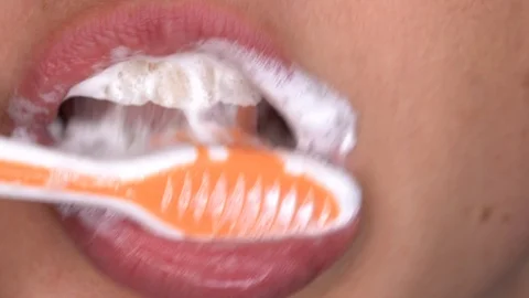 Closeup macro teeth brushing Video stock 110900570