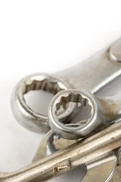 Closeup macro used old tools wrench isolated over white background Foto stock