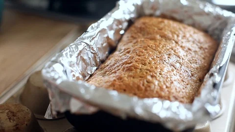 Closeup macro view of freshly baked homemade nut cupcake bread with sunshine on  Stock Footage 129220237