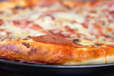 Closeup macro view pizza slice Stock Photos