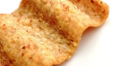 Closeup macro of whole grain corn chip isolated on white background Stock Footage 75806921