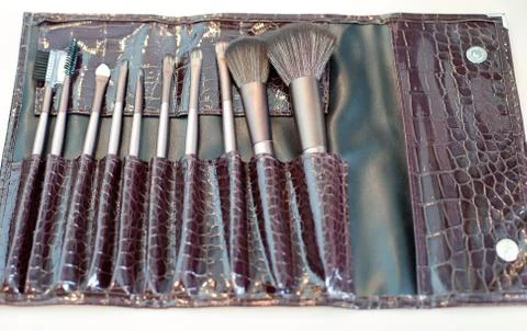 Closeup of makeup tools in their holder Stock Photos