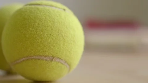 Closeup: making choice of sport or sweets, tennis ball, cake Stock Footage 100194358