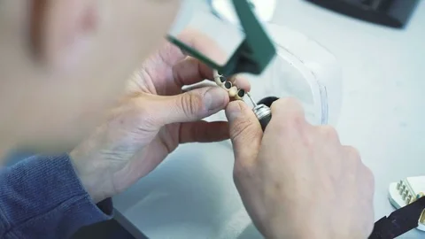 Closeup of making teeth crowns in dental lab in 4k Stock Footage