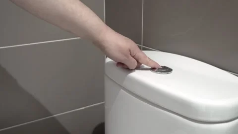 Closeup of male hand pushing a button Stockbeeldmateriaal 333051569