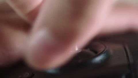 Closeup male hands install remote control stick and try of control drone Stock Footage 169979254