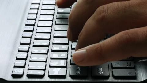 Closeup male hands typing on bluetooth keyboard Stock Footage 127447484
