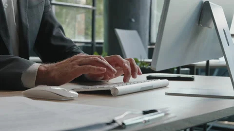 Closeup male hands unrecognizable worker programmer Caucasian man in formal suit Stock Footage 205617653