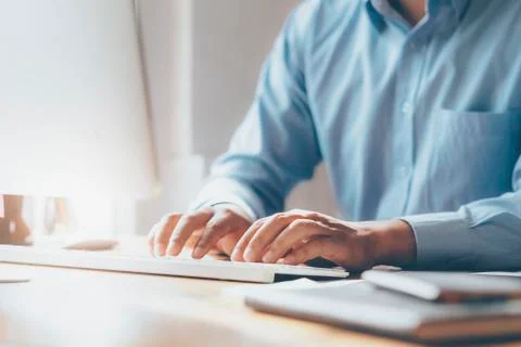 Closeup male hands using computer. 스톡 사진