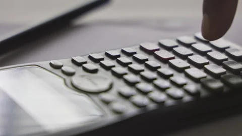 Closeup of a male student using a math function calculator or scientific ca.. Stock Footage 241175886