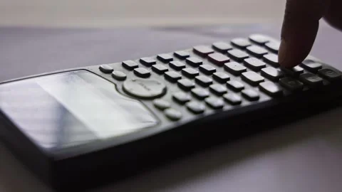 Closeup of a male student using a math function calculator or scientific ca.. Stock Footage 241175954