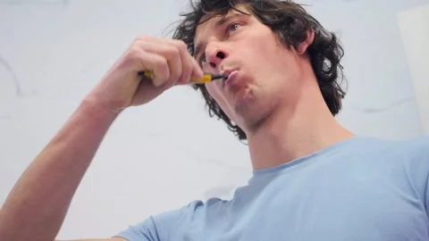 Closeup Of Man Brushing Teeth Energetically, Person Engaged In Morning Dental H Stock Footage 326867327