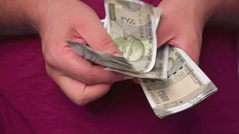 Closeup of Man Counting 500 Indian Rupees 스톡 동영상 306002963