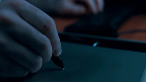 Closeup of man drawing on graphic tablet Stock Footage 103497636