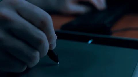 Closeup of man drawing on graphic tablet Stock Footage 103497735