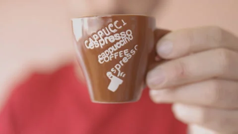 Closeup of man that drinks an Espresso coffee, then smiles Stock Footage 148201347