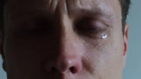Closeup man eye crying. Depressed young man, macro Stock Footage 311871282