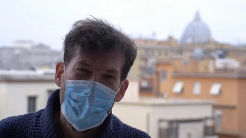 Closeup of man feeling sick with coronavirus in city Stock Footage 125738758