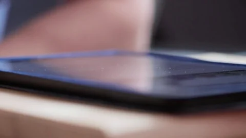 Closeup man finger touch scroll page app on tablet. Browsing movie on touchpad Stock Footage 80008314