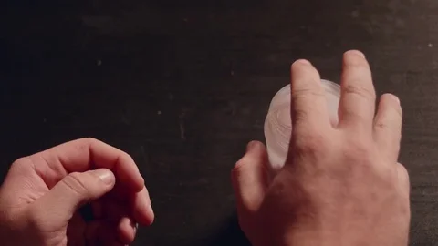 Closeup of a man getting a piece of Gum Stock Footage 80720294