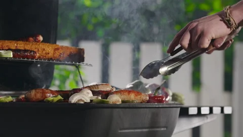 Closeup Of A Man Grilling Barbeque. Video stock 211728913