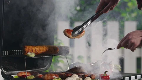 Closeup Of A Man Grilling Barbeque. Video stock 211732527