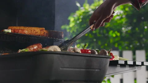 Closeup Of A Man Grilling Barbeque. Video stock 211732999