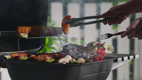 Closeup Of A Man Grilling Barbeque. Video stock 211733059