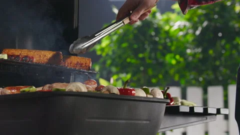 Closeup Of A Man Grilling Barbeque. Video stock 211734966