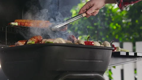 Closeup Of A Man Grilling Barbeque. Video stock 211736581