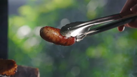 Closeup Of A Man Grilling Barbeque. Video stock 211760210
