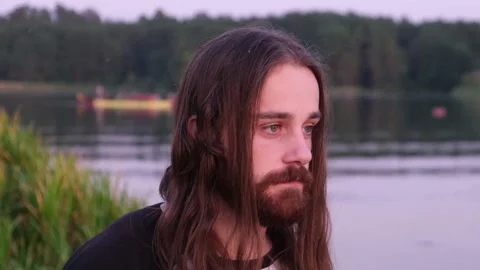 Closeup of Man with guilty face at river shore background. Stock Footage 119149209