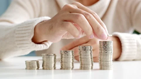 Closeup man hand stacking coin for save money concept Stock Footage 147139940