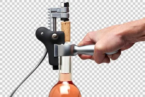 Closeup of a man hand using modern metal cork screw Stock Photos