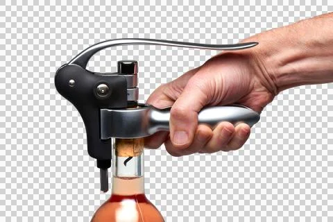 Closeup of a man hand using modern metal cork screw Stock Photos