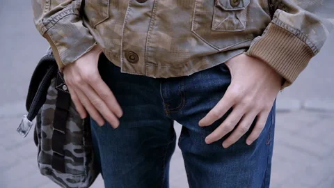 Closeup of man with hands in pockets Stock Footage 106146461