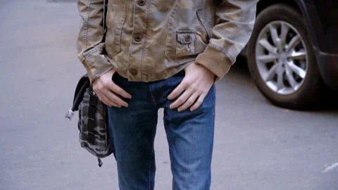 Closeup of man with hands in pockets Stock Footage 106148095