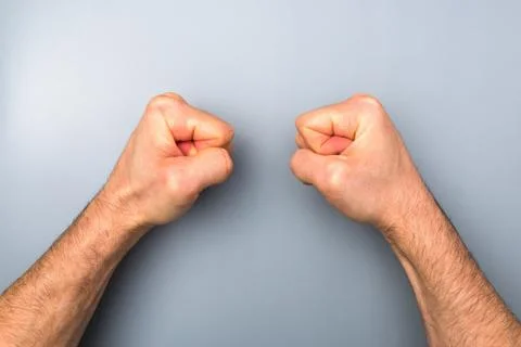 Closeup man hands pounding the table. getting crazy because of quarantine Stock Photos