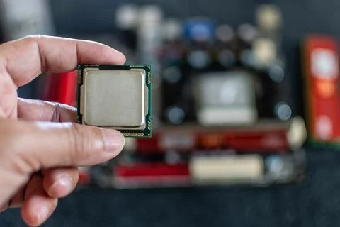 Closeup, Man holding CPU (Central processor Unit), Concept for fix, repair,.. Stock Photos