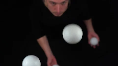 Closeup of man juggling balls. Concept of success, business and managing Stock Footage 127390419