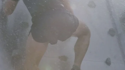 Closeup of man on obstacle course Stock Footage 73055186