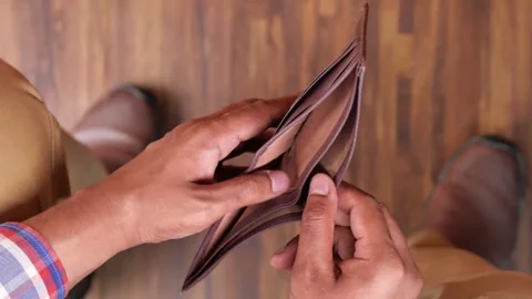 Closeup man opens an empty wallet with no money has nothing to pay. Poverty, Video stock 336450644