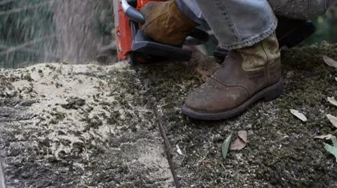 Closeup of man operating chainsaw Stock Footage 8959846