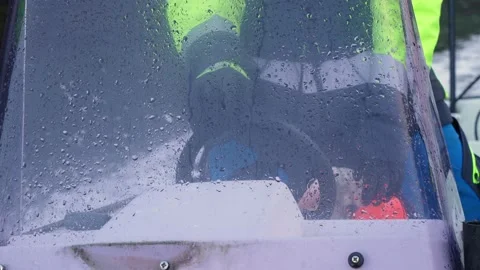 Closeup man piloting adjusting steering boat wheel helm Stock Footage 203940981