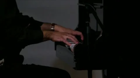 Closeup of man playing piano Stock Footage 20523648